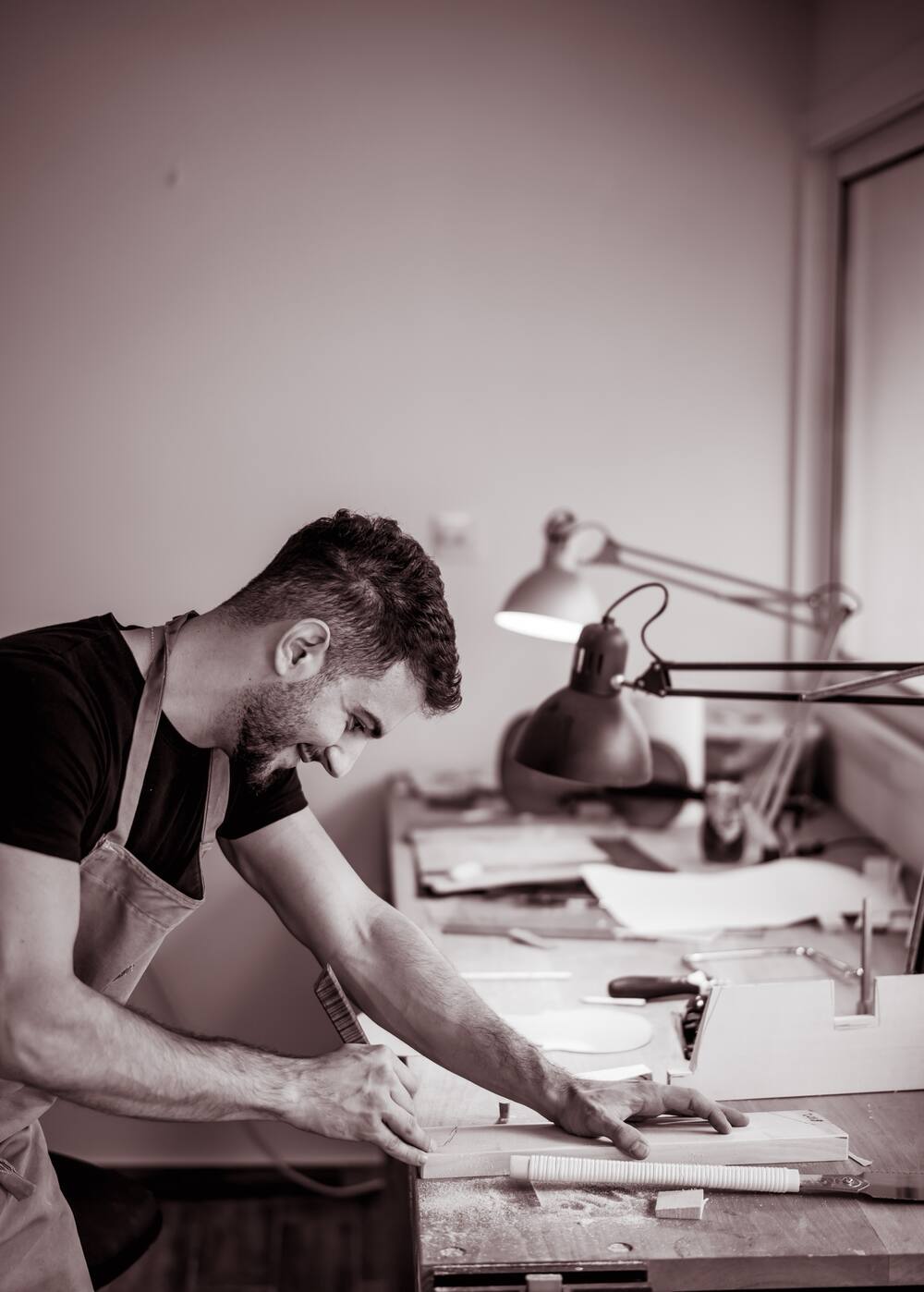 Marios carving a new violin body in the workshop
