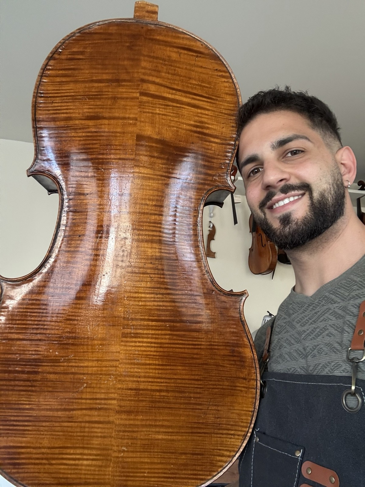 Marios with the finished, varnished cello