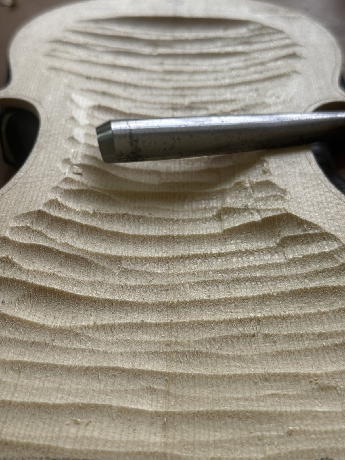 Carving the arching of the top plate