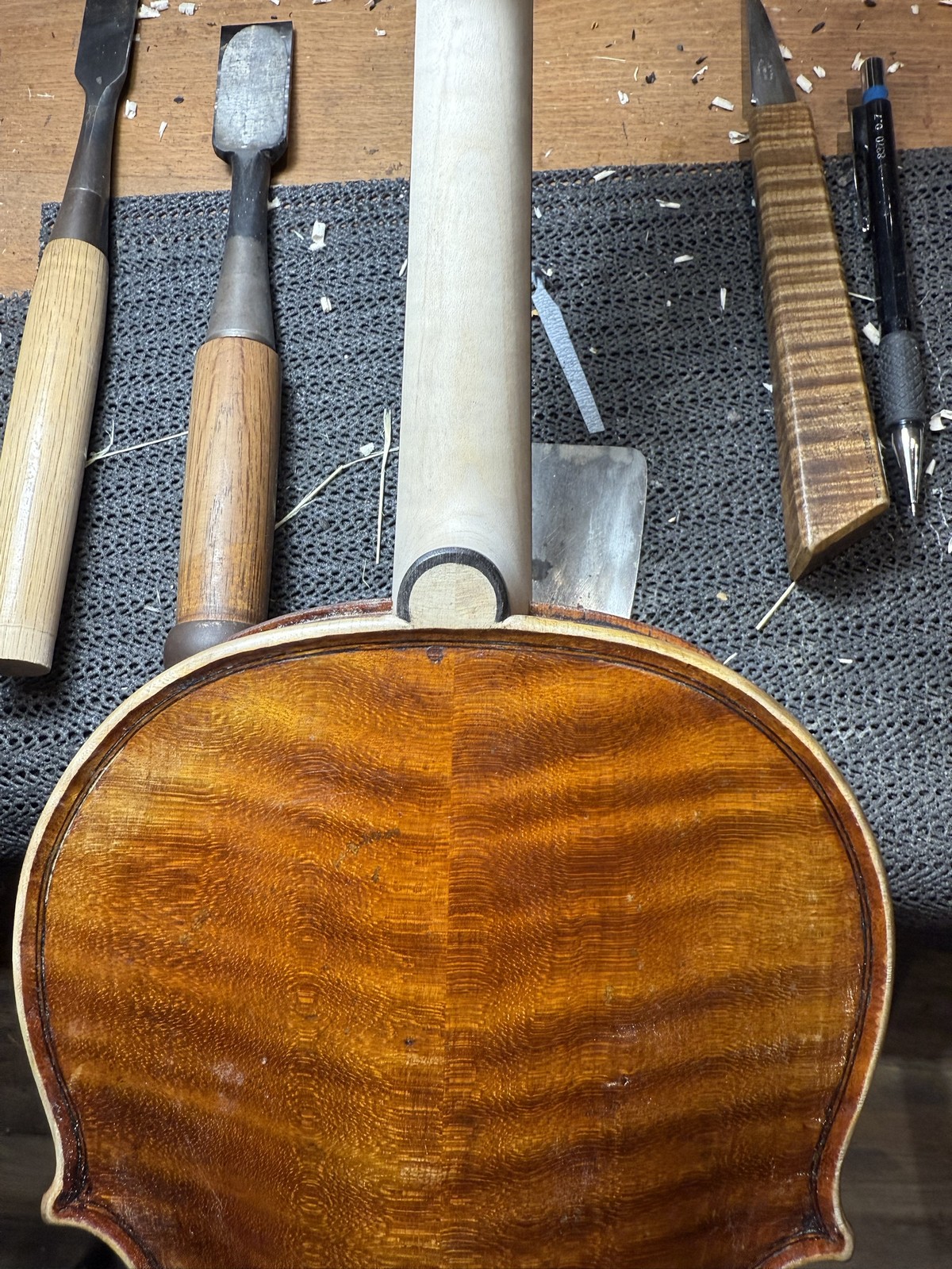 Final tool work on a finished back