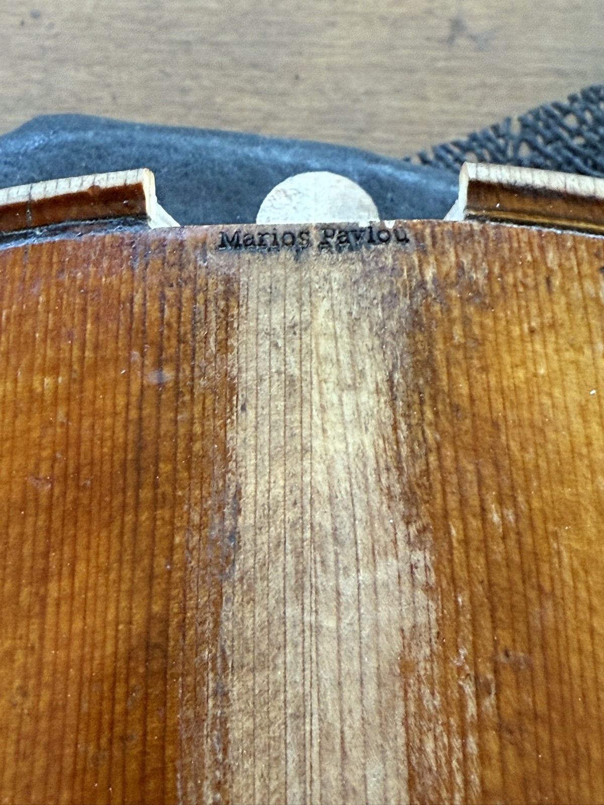 His signature stamped inside every instrument